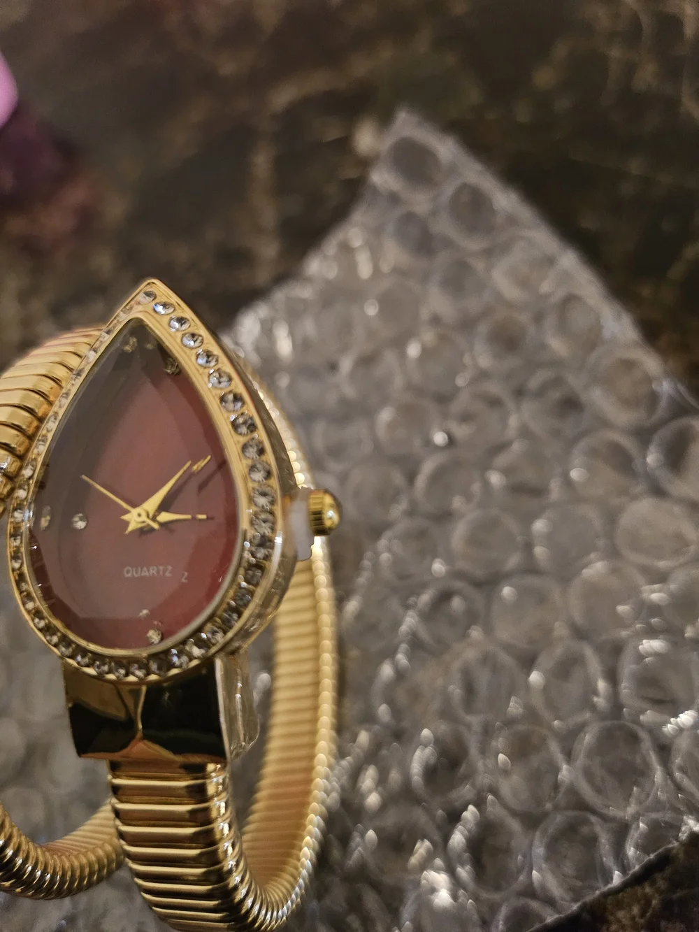 & Other Stories Gold Coil Bangle Watch with Red Teardrop Dial